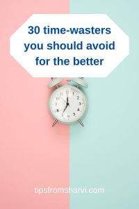 Clock on light pink and green background. Text: 30 time-wasters you should avoid for the better, tipsfromsharvi.com.