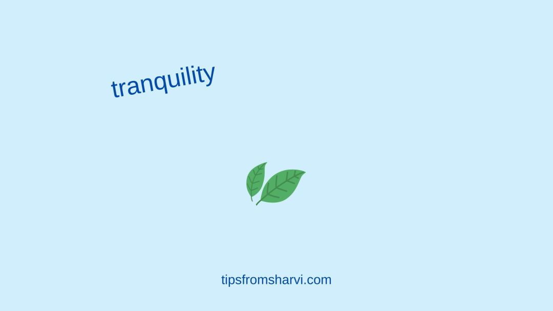 Two green leaves. Text: tranquility, tipsfromsharvi.com.